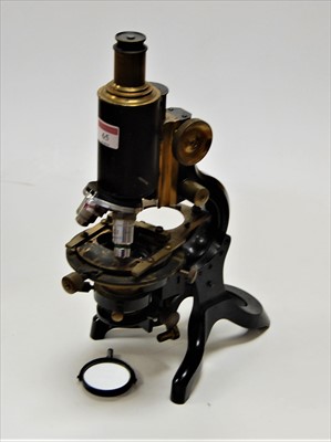 Lot 65 - A circa 1900 lacquered brass and iron...