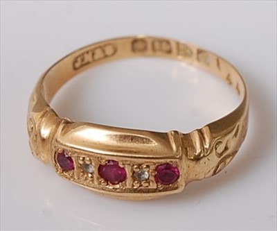 Lot 410 - A vintage 18ct gold, ruby and diamond point...