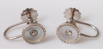 Lot 439 - A pair of circa 1930s 9ct white gold, mother...
