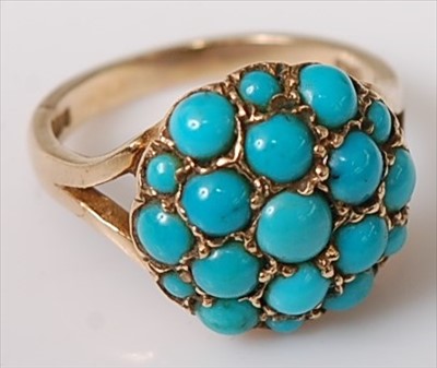 Lot 456 - A 9ct gold and turquoise set cluster ring,...