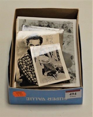 Lot 494 - A collection of black & white photographs many...