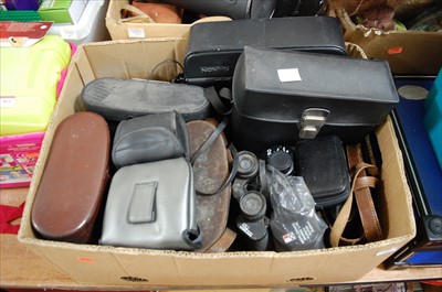 Lot 559 - Three boxes containing a collection of cameras,...