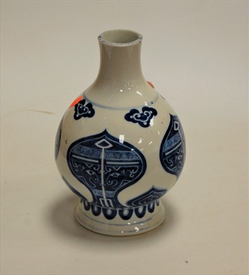 Lot 509 - A Chinese stoneware vase of squat baluster...