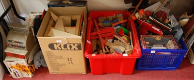 Lot 566 - A collection of childrens toys, to include an...
