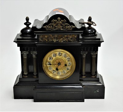 Lot 569 - A Victorian black slate mantel clock, of...