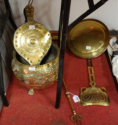 Lot 596 - A collection of brassware, to include a set of...