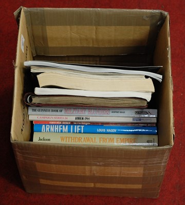 Lot 604 - A small collection of books of military...