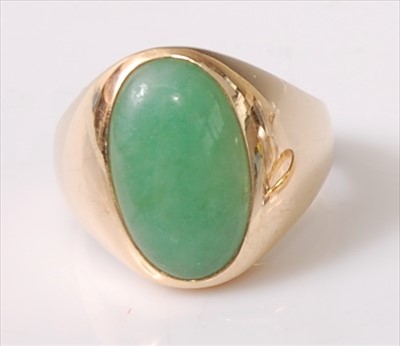 Lot 2203 - A 9ct yellow gold jadeite oval signet ring,...