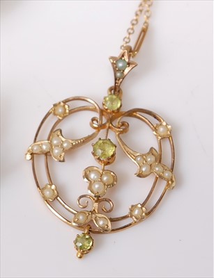 Lot 2202 - An Edwardian yellow metal, green peridot and...