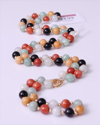 Lot 2199 - A multi-coloured jadeite bead necklace and...