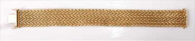 Lot 2193 - An 18ct yellow gold Milanese style bracelet,...