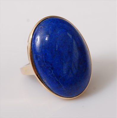 Lot 2212 - A yellow metal dress ring, featuring a 28 x...