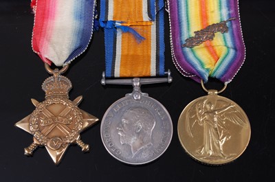 Lot 112 - A WW I trio to include 1914-15 Star