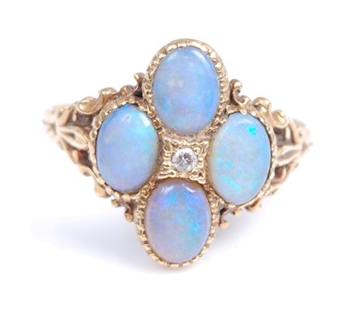 Lot 2219 - An 18ct yellow gold opal doublet quatrefoil...