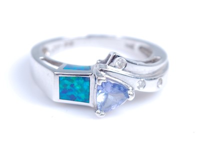 Lot 2041 - A white metal tanzanite and diamond crossover...