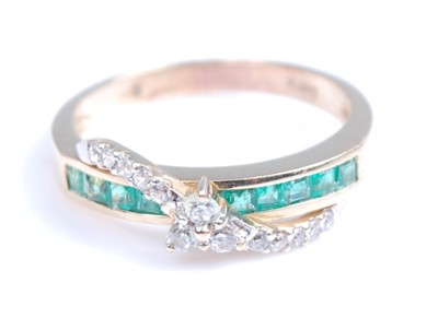 Lot 2249 - A yellow metal emerald and colourless sapphire...