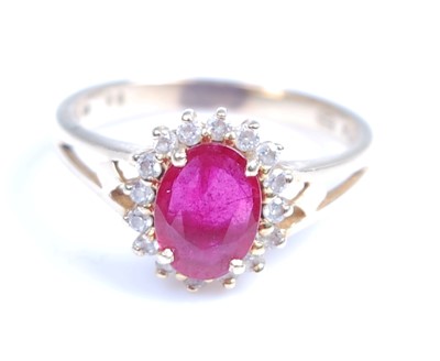Lot 2250 - A yellow metal ruby and colourless sapphire...
