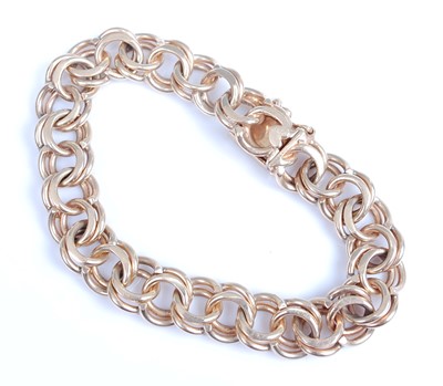 Lot 2252 - A yellow metal double interwoven circular link...