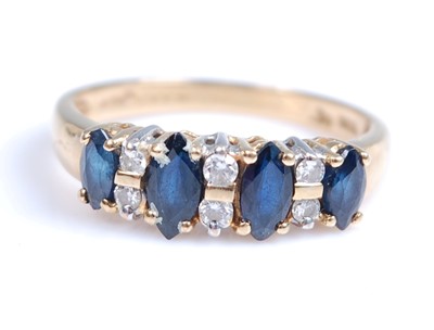 Lot 2005 - An 18ct yellow and white gold, sapphire and...