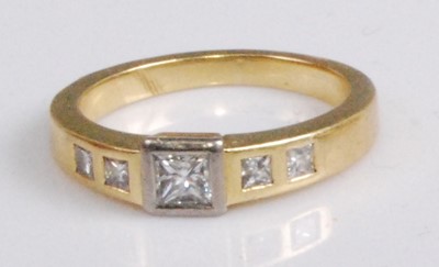Lot 2054 - An Art Deco style yellow metal diamond set...