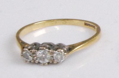 Lot 2094 - An 18ct gold and platinum diamond set...