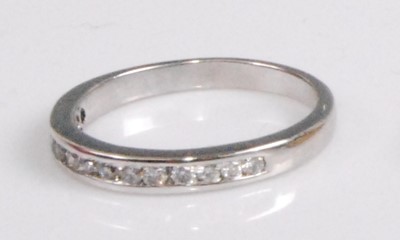 Lot 2113 - A contemporary 18ct white gold diamond half...