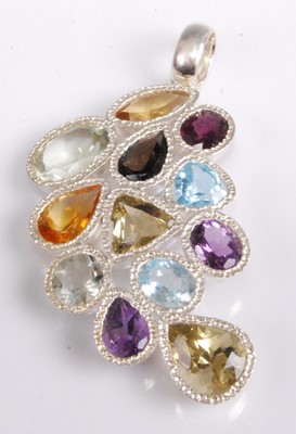 Lot 2091 - A contemporary silver multi-stone pendant, to...