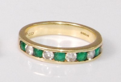 Lot 2238 - A contemporary 18ct gold, emerald and diamond...