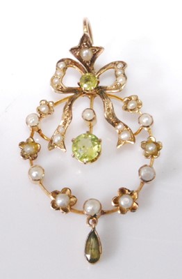 Lot 2240 - An Edwardian green peridot and seed pearl set...