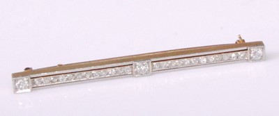 Lot 2247 - A yellow metal, platinum faced, diamond set...