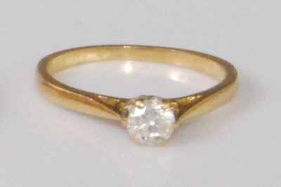 Lot 2268 - A contemporary 18ct gold diamond solitaire...