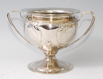 Lot 73 - An Art Nouveau silver twin handled pedestal...