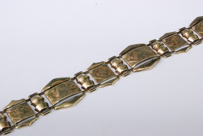 Lot 2275 - A yellow metal sectional bracelet, having leaf...