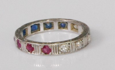 Lot 2278 - A white metal, ruby, diamond and sapphire set '...