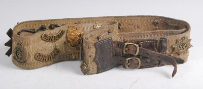 Lot 50 - A canvas webbing belt