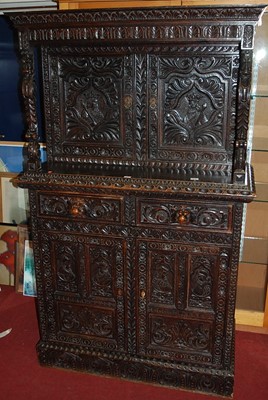 Lot 1116 - A late 19th century heavily carved and...