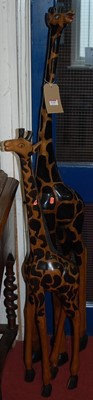 Lot 1128 - Two contemporary African carved hardwood...