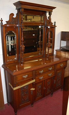 Lot 1144 - An Edwardian floral relief carved walnut...