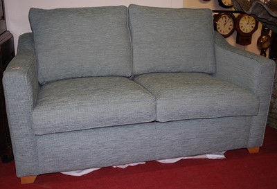 Lot 1168 - A contemporary fabric upholstered two-seater...