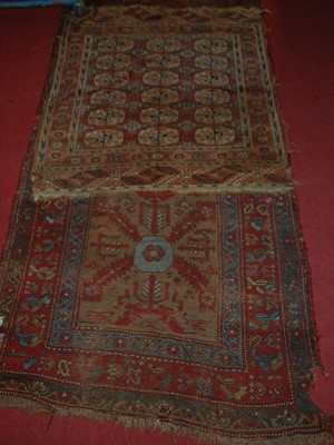 Lot 1178 - A Persian woollen red ground hall runner,...