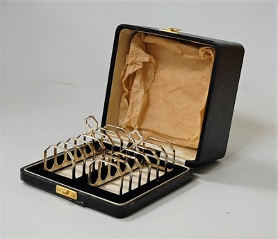 Lot 241 - A cased pair of Art Deco silver six division...