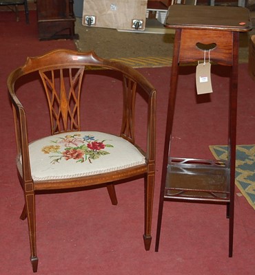 Lot 1201 - An Edwardian mahogany two-tier plant stand;...