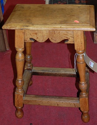 Lot 1220 - An early 20th century joined oak joint stool,...