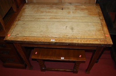 Lot 1225 - A 1930s faded oak fold-over dining table,...
