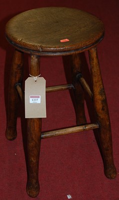 Lot 1237 - An early 20th century provincial circular elm...