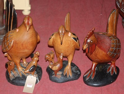 Lot 1245 - Three various contemporary African carved...