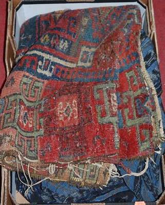 Lot 1247 - A Persian woollen red ground rug (worn);...