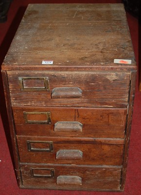 Lot 1274 - An early 20th century pitched pine four drawer...