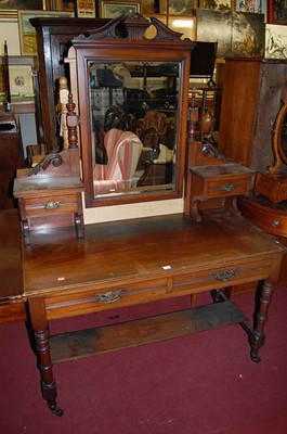 Lot 1280 - A late Victorian walnut bevelled swing...