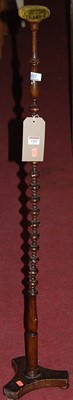 Lot 1282 - A late 19th century stained wood bobbin turned...